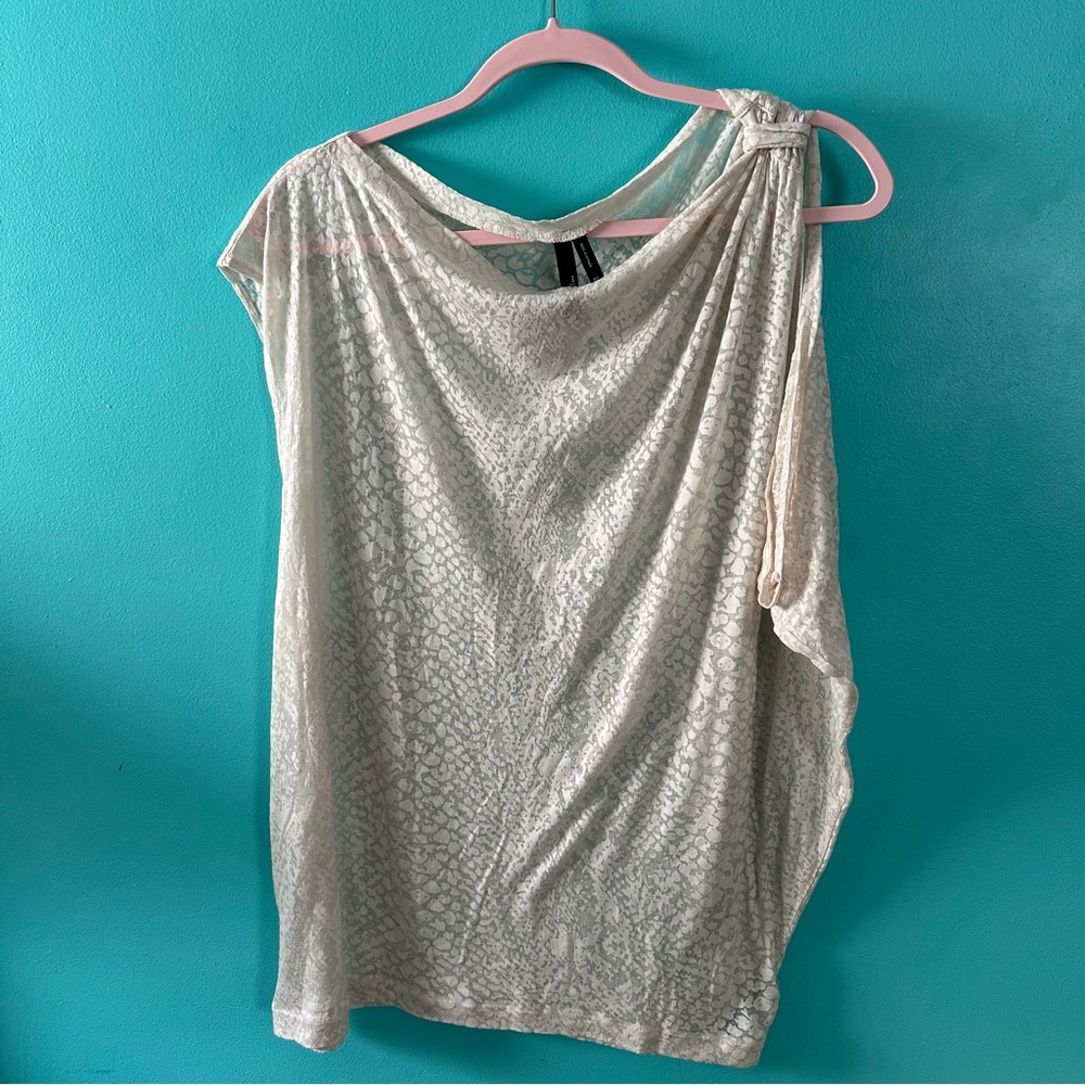 Sheer asymmetric top with abstract animal pattern